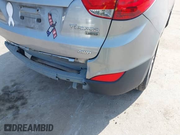 2010 Hyundai Tucson GLS with VIN KM8JUCAC2AU078658, listed as a IAAI auction lot 41726534 with 140,155 mi miles and . Bid and sale history available at DreamBid. Image 14.