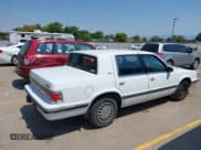 ✅ 1992 Dodge Dynasty LE • VIN: 1B3XC56RXND723509 • Lot: 42769093. Listed on IAAI with 99,589 mi. Free auction sales archive from the USA and detailed vehicle history report at DreamBid. Image 4.