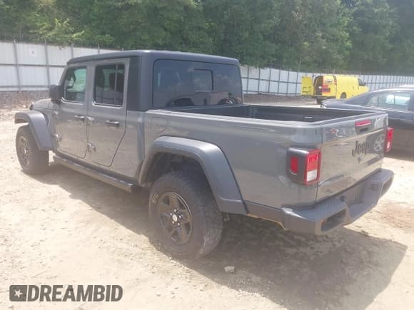 ✅ 2023 Jeep Gladiator Sport S • VIN: 1C6HJTAG7PL522721 • Лот: 42594463. Опубликован ранее на IAAI с пробегом 64 702 миль. Бесплатный доступ к архиву аукционных продаж из США и подробный отчёт об истории автомобиля на DreamBid. Изображение 3.