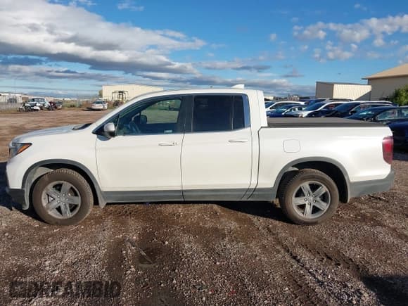 ✅ 2022 Honda Ridgeline RTL • VIN: 5FPYK3F50NB025921 • Lot: 43483259. Listed on IAAI with 45,266 mi. Free auction sales archive from the USA and detailed vehicle history report at DreamBid. Image 14.