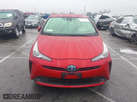 ✅ 2021 Toyota Prius L Eco • VIN: JTDKAMFU8M3134640 • Lot: 41512395. Listed on IAAI with 30,509 mi. Free auction sales archive from the USA and detailed vehicle history report at DreamBid. Image 12.