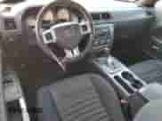 2013 Dodge Challenger SXT z VIN 2C3CDYAGXDH675954, wystawiony jako Copart lot #63340634 z przebiegiem 69 699 mil mil oraz Szkoda całkowita • Salvage title. Historia ofert i sprzedaży dostępna na DreamBid. Obrazek 8.