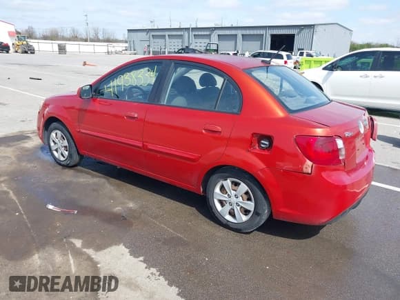 ✅ 2011 Kia Rio LX • VIN: KNADH4A37B6944224 • Lot: 41938334. Listed on IAAI with 116,116 mi. Free auction sales archive from the USA and detailed vehicle history report at DreamBid. Image 3.