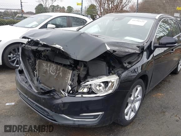 ✅ 2016 Volvo V60 T5 Drive-E Premier • VIN: YV140MEK5G1299728 • Lot: 41550325. Wystawiony na IAAI z przebiegiem 134 507 mil. Bezpłatny archiwum sprzedaży aukcyjnych z USA i szczegółowy raport historii pojazdu na DreamBid. Zdjęcie 6.