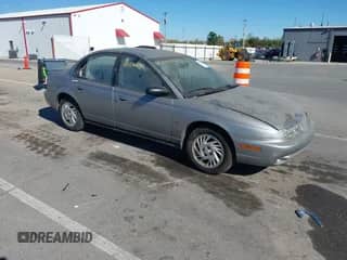 1999 Saturn SL с VIN 1G8ZK5279XZ151735, выставлен на аукционе IAAI как лот 43476690 с пробегом Не указан миль и . История ставок и продаж доступна на DreamBid. Изображение 1.