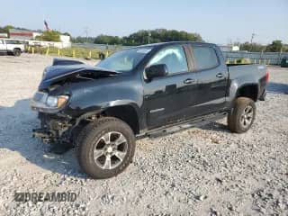 2018 Chevrolet Colorado 4WD Z71 z VIN 1GCGTDEN8J1123753, wystawiony jako Copart lot #81324545 z przebiegiem 149 420 mil mil oraz Szkoda całkowita • Salvage title. Historia ofert i sprzedaży dostępna na DreamBid. Obrazek 1.