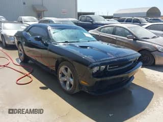 ✅ 2013 Dodge Challenger Rallye Redline • VIN: 2C3CDYAG9DH650978 • Lot: 41690345. Wystawiony na IAAI z przebiegiem 145 135 mil. Bezpłatny archiwum sprzedaży aukcyjnych z USA i szczegółowy raport historii pojazdu na DreamBid. Zdjęcie 1.