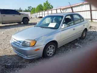 2005 Hyundai Accent GLS z VIN KMHCG45C05U611631, wystawiony jako IAAI lot #43112047 z przebiegiem 171 240 mil mil oraz . Historia ofert i sprzedaży dostępna na DreamBid. Obrazek 2.