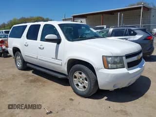 ✅ 2014 Chevrolet Suburban LT • VIN: 1GNSKJE70ER202460 • Lot: 42090452. Listed on IAAI with 181,450 mi. Free auction sales archive from the USA and detailed vehicle history report at DreamBid. Image 1.