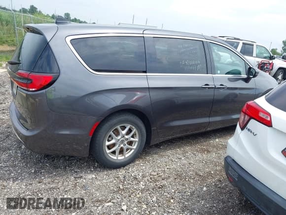 ✅ 2023 Chrysler Pacifica Touring L • VIN: 2C4RC1BG4PR530454 • Лот: 42699258. Опубликован ранее на IAAI с пробегом 58 789 миль. Бесплатный доступ к архиву аукционных продаж из США и подробный отчёт об истории автомобиля на DreamBid. Изображение 13.