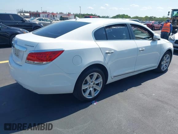 ✅ 2012 Buick LaCrosse Leather • VIN: 1G4GC5E33CF350242 • Лот: 42231224. Опубликован ранее на IAAI с пробегом 92 036 миль. Бесплатный доступ к архиву аукционных продаж из США и подробный отчёт об истории автомобиля на DreamBid. Изображение 4.