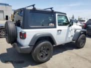 ✅ 2025 Jeep Wrangler Sport • VIN: 1C4PJXAN2SW576316 • Lot: 60550635. Listed on Copart with 1,730 mi. Free auction sales archive from the USA and detailed vehicle history report at DreamBid. Image 3.