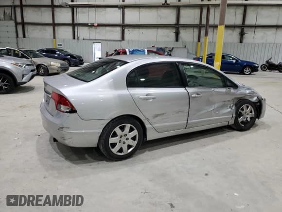 ✅ 2009 Honda Civic LX • VIN: 1HGFA16569L014742 • Лот: 90343195. Опубликован ранее на Copart с пробегом 115 308 миль. Бесплатный доступ к архиву аукционных продаж из США и подробный отчёт об истории автомобиля на DreamBid. Изображение 3.