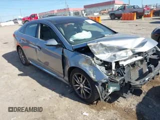 ✅ 2015 Hyundai Sonata Sport • VIN: 5NPE34AB9FH084447 • Lot: 43720890. Listed on IAAI with 136,162 mi. Free auction sales archive from the USA and detailed vehicle history report at DreamBid. Image 1.