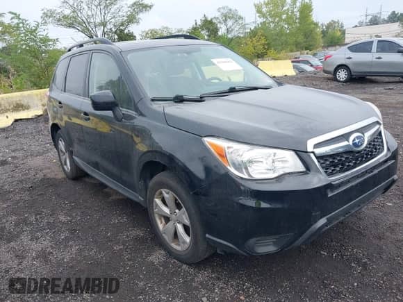 2015 Subaru Forester Premium with VIN JF2SJADCXFG543826, listed as a IAAI auction lot 43306662 with 165,478 mi miles and . Bid and sale history available at DreamBid. Image 1.