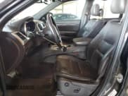 ✅ 2014 Jeep Grand Cherokee • VIN: 1C4RJEJM8EC424373 • Lot: 72256674. Listed on Copart with 128,998 mi. Free auction sales archive from the USA and detailed vehicle history report at DreamBid. Image 7.