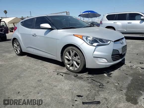 2017 Hyundai Veloster с VIN KMHTC6AD3HU308336, выставлен на аукционе Copart как лот 65843884 с пробегом 165 249 миль миль и Списание • Salvage title. История ставок и продаж доступна на DreamBid. Изображение 11.