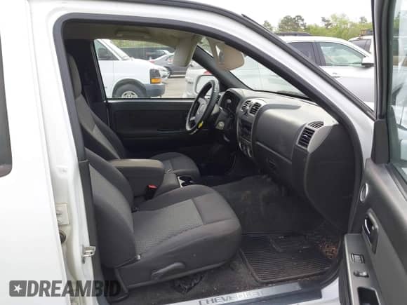 2012 Chevrolet Colorado 1LT z VIN 1GCDSCFE0C8101609, wystawiony jako IAAI lot #41914027 z przebiegiem 143 805 mil mil oraz . Historia ofert i sprzedaży dostępna na DreamBid. Obrazek 5.