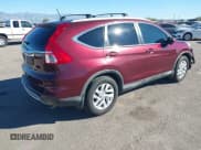 ✅ 2015 Honda CR-V EX-L • VIN: 2HKRM3H7XFH557041 • Lot: 43561107. Listed on IAAI with 146,461 mi. Free auction sales archive from the USA and detailed vehicle history report at DreamBid. Image 4.