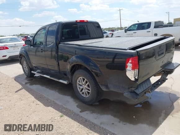 2014 Nissan Frontier S with VIN 1N6BD0CT0EN722644, listed as a IAAI auction lot 42985172 with 93,325 mi miles and . Bid and sale history available at DreamBid. Image 3.