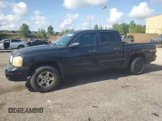 2006 Dodge Dakota SLT z VIN 1D7HE48NX6S664515, wystawiony jako Copart lot #63141385 z przebiegiem 198 645 mil mil oraz Szkoda całkowita • Salvage title. Historia ofert i sprzedaży dostępna na DreamBid. Obrazek 1.