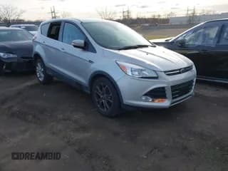 ✅ 2013 Ford Escape SEL • VIN: 1FMCU9HX0DUA78893 • Lot: 43870119. Listed on IAAI with 110,347 mi. Free auction sales archive from the USA and detailed vehicle history report at DreamBid. Image 1.
