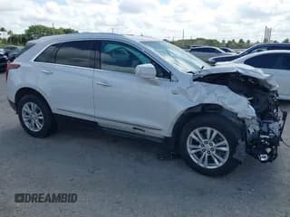 ✅ 2021 Cadillac XT5 FWD Luxury • VIN: 1GYKNAR40MZ146268 • Лот: 41522802. Опубликован ранее на IAAI с пробегом 61 775 миль. Бесплатный доступ к архиву аукционных продаж из США и подробный отчёт об истории автомобиля на DreamBid. Изображение 1.