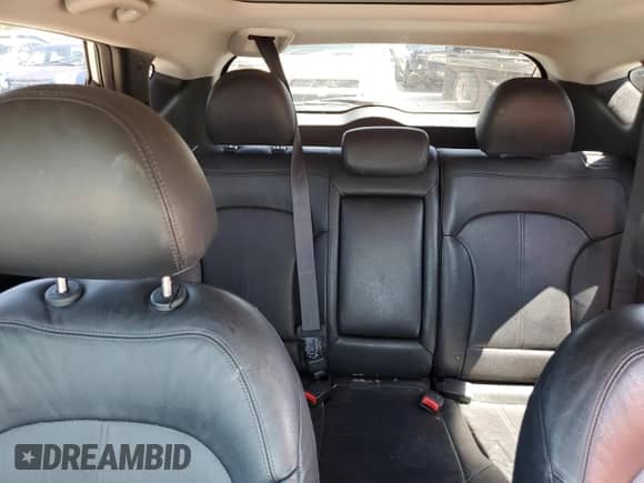 2013 Hyundai Tucson Limited z VIN KM8JUCAC9DU557664, wystawiony jako Copart lot #53707934 z przebiegiem 148 967 mil mil oraz Szkoda całkowita • Salvage title. Historia ofert i sprzedaży dostępna na DreamBid. Obrazek 10.