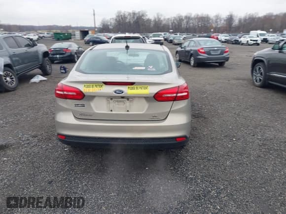 ✅ 2015 Ford Focus SE • VIN: 1FADP3F28FL382363 • Lot: 43733904. Listed on IAAI with 103,684 mi. Free auction sales archive from the USA and detailed vehicle history report at DreamBid. Image 16.