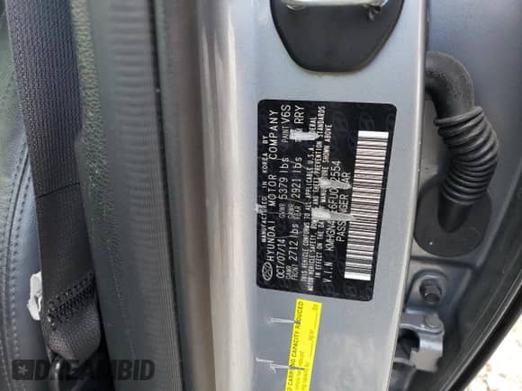 2015 Hyundai Genesis 3.8L z VIN KMHGN4JE6FU052554, wystawiony jako Copart lot #71422824 z przebiegiem 79 836 mil mil oraz Szkoda całkowita • Salvage title. Historia ofert i sprzedaży dostępna na DreamBid. Obrazek 12.