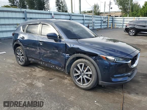 ✅ 2018 Mazda CX-5 Touring • VIN: JM3KFACM6J1448886 • Lot: 91935085. Wystawiony na Copart z przebiegiem 102 177 mil. Bezpłatny archiwum sprzedaży aukcyjnych z USA i szczegółowy raport historii pojazdu na DreamBid. Zdjęcie 4.