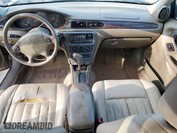 1998 Chevrolet Malibu LS z VIN 1G1NE52M7W6221792, wystawiony jako Copart lot #87316734 z przebiegiem 152 176 mil mil oraz Szkoda całkowita • Salvage title. Historia ofert i sprzedaży dostępna na DreamBid. Obrazek 8.