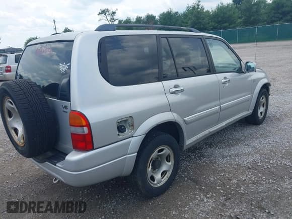 ✅ 2002 Suzuki XL7 Standard • VIN: JS3TX92V624124535 • Lot: 42522274. Listed on IAAI with 180,814 mi. Free auction sales archive from the USA and detailed vehicle history report at DreamBid. Image 4.