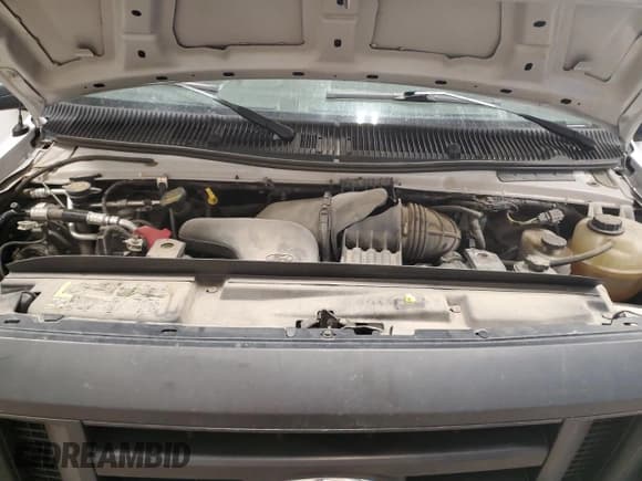 ✅ 2013 Ford Econoline Cargo Commercial • VIN: 1FTNE2EWXDDA50385 • Lot: 70865015. Listed on Copart with 72,517 mi. Free auction sales archive from the USA and detailed vehicle history report at DreamBid. Image 12.