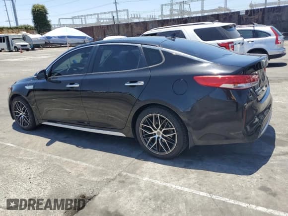✅ 2018 Kia Optima Premium • VIN: KNAGT4LE8J5023841 • Лот: 61431235. Опубликован ранее на Copart с пробегом 193 841 миль. Бесплатный доступ к архиву аукционных продаж из США и подробный отчёт об истории автомобиля на DreamBid. Изображение 2.