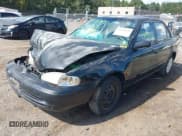 ✅ 2001 Chevrolet Prizm • VIN: 1Y1SK52811Z425173 • Лот: 43148450. Опубликован ранее на IAAI с пробегом 143 218 миль. Бесплатный доступ к архиву аукционных продаж из США и подробный отчёт об истории автомобиля на DreamBid. Изображение 2.