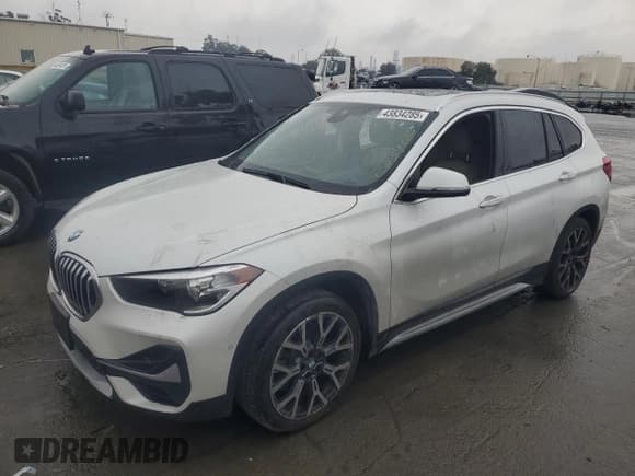 ✅ 2022 BMW X1 xDrive28i • VIN: WBXJG9C02N5V14574 • Lot: 43834285. Listed on Copart with 63,266 mi. Free auction sales archive from the USA and detailed vehicle history report at DreamBid. Image 1.