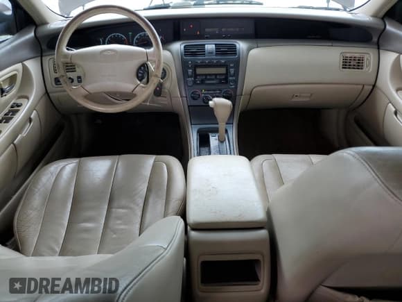 ✅ 2000 Toyota Avalon XL • VIN: 4T1BF28B3YU042591 • Лот: 68277995. Опубликован ранее на Copart с пробегом 312 652 миль. Бесплатный доступ к архиву аукционных продаж из США и подробный отчёт об истории автомобиля на DreamBid. Изображение 8.