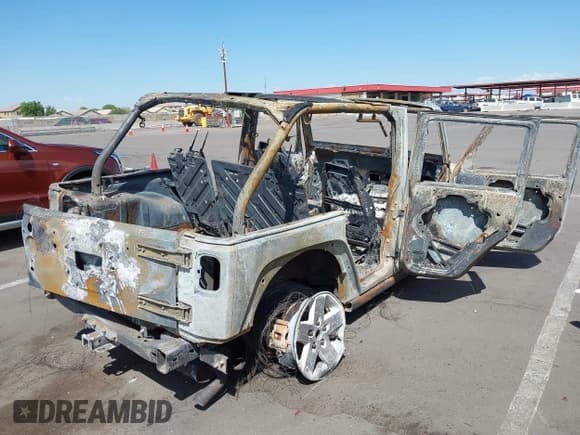 ✅ 2007 Jeep Wrangler Unlimited Sahara • VIN: 1J4GA59167L101437 • Lot: 43159209. Listed on IAAI with Not provided. Free auction sales archive from the USA and detailed vehicle history report at DreamBid. Image 4.