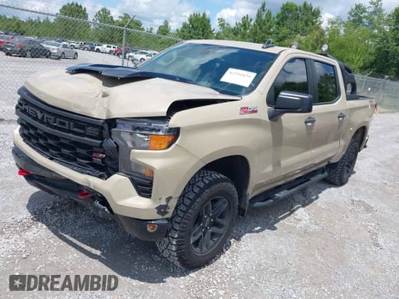 2022 Chevrolet Silverado 1500 Custom Trail Boss with VIN 3GCPDCEDXNG569831, listed as a IAAI auction lot 42241829 with 11,734 mi miles and . Bid and sale history available at DreamBid. Image 2.
