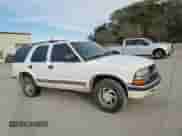 1999 Chevrolet Blazer LT с VIN 1GNDT13W1X2163194, выставлен на аукционе Copart как лот 82897414 с пробегом Не указан миль и Списание • Salvage title. История ставок и продаж доступна на DreamBid. Изображение 11.