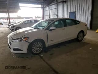✅ 2016 Ford Fusion S Hybrid • VIN: 3FA6P0UU0GR208303 • Lot: 81883075. Wystawiony na Copart z przebiegiem 180 857 mil. Bezpłatny archiwum sprzedaży aukcyjnych z USA i szczegółowy raport historii pojazdu na DreamBid. Zdjęcie 1.