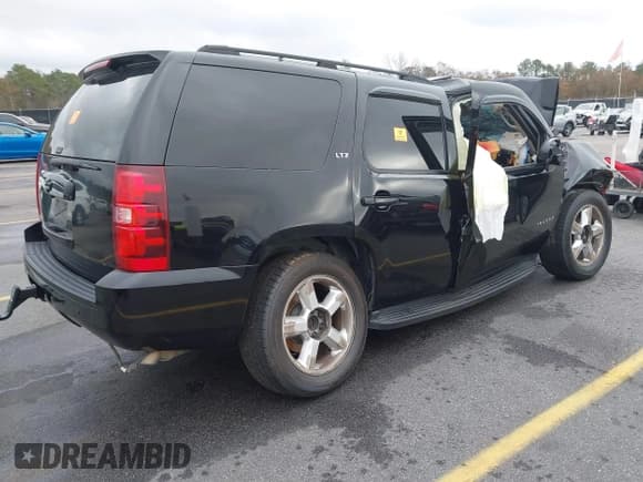 ✅ 2007 Chevrolet Tahoe LT • VIN: 1GNFC13J17R175026 • Lot: 41052039. Listed on IAAI with 336,184 mi. Free auction sales archive from the USA and detailed vehicle history report at DreamBid. Image 4.