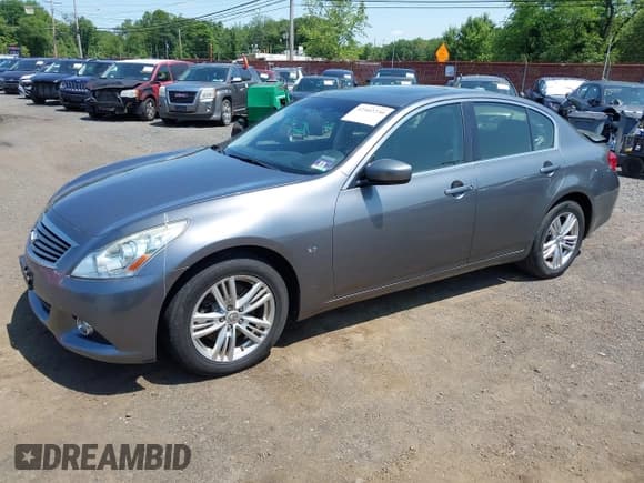 ✅ 2015 Infiniti Q40 • VIN: JN1CV6AR5FM522805 • Lot: 42402230. Listed on IAAI with 154,027 mi. Free auction sales archive from the USA and detailed vehicle history report at DreamBid. Image 18.