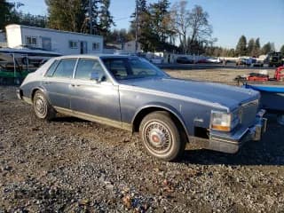✅ 1984 Cadillac Seville • VIN: 1G6AS6987EE810927 • Lot: 42836105. Wystawiony na Copart z przebiegiem 19 894 mil. Bezpłatny archiwum sprzedaży aukcyjnych z USA i szczegółowy raport historii pojazdu na DreamBid. Zdjęcie 4.