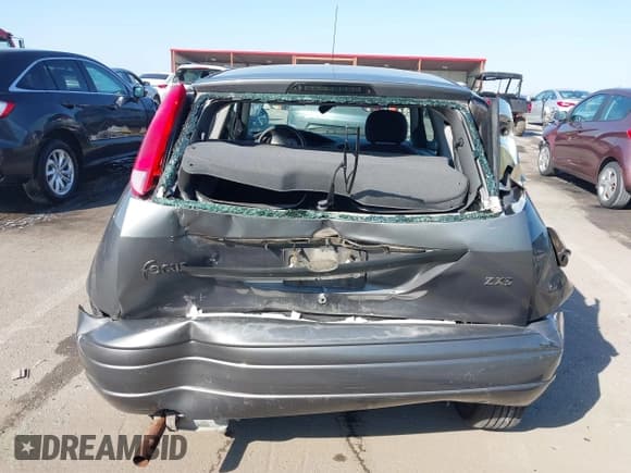 ✅ 2003 Ford Focus ZX3 • VIN: 3FAFP313X3R114873 • Lot: 43330293. Listed on IAAI with 135,938 mi. Free auction sales archive from the USA and detailed vehicle history report at DreamBid. Image 16.