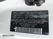 ✅ 2014 Hyundai Veloster • VIN: KMHTC6AD6EU211479 • Lot: 41196275. Wystawiony na IAAI z przebiegiem 132 337 mil. Bezpłatny archiwum sprzedaży aukcyjnych z USA i szczegółowy raport historii pojazdu na DreamBid. Zdjęcie 9.