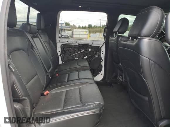 2020 Ram 1500 Rebel z VIN 1C6SRFLM1LN230872, wystawiony jako Copart lot #55671585 z przebiegiem 97 202 mil mil oraz Szkoda całkowita • Salvage title. Historia ofert i sprzedaży dostępna na DreamBid. Obrazek 10.