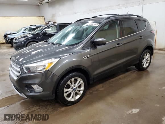 ✅ 2018 Ford Escape SE • VIN: 1FMCU9GD3JUA90992 • Lot: 57409845. Wystawiony na Copart z przebiegiem 112 658 mil. Bezpłatny archiwum sprzedaży aukcyjnych z USA i szczegółowy raport historii pojazdu na DreamBid. Zdjęcie 1.