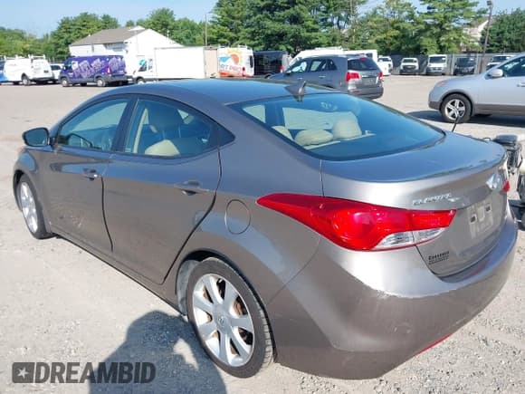 ✅ 2013 Hyundai Elantra GLS • VIN: 5NPDH4AE3DH240275 • Lot: 42819323. Listed on IAAI with 143,276 mi. Free auction sales archive from the USA and detailed vehicle history report at DreamBid. Image 3.